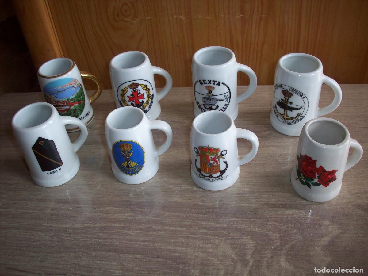 Coleccionismo: lote de ocho jarritas de ceramica militares en su caja