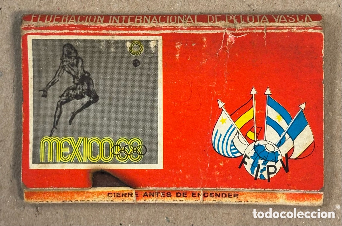 Coleccionismo: FEDERACI&Oacute;N ESPA&Ntilde;OLA DE PELOTA VASCA - JJ.OO. M&Eacute;XICO 68. ANTIGUA CAJETILLA DE CERILLAS PUBLICITARIA.