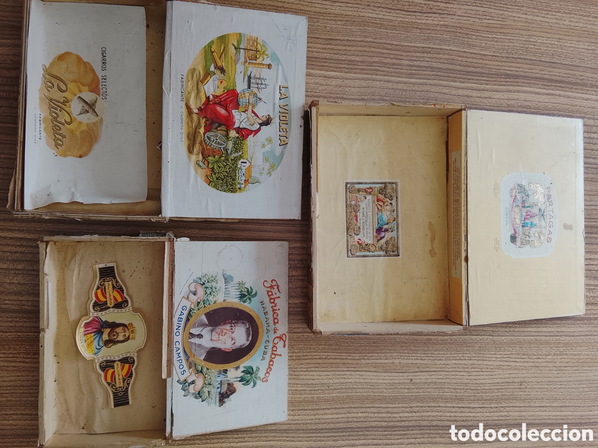 Cajas de puros vac&iacute;as, la Violeta, partagas y Gabino campos.