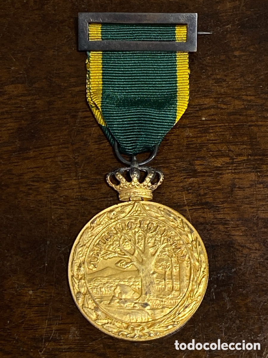 Coleccionismo: MEDALLA AL MERITO FORESTAL 1848 - 1948, mide 4 cm.