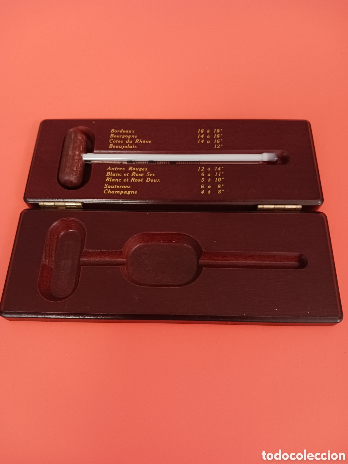 Sammeln: Term&oacute;metro de vinos en su estuche de madera.
