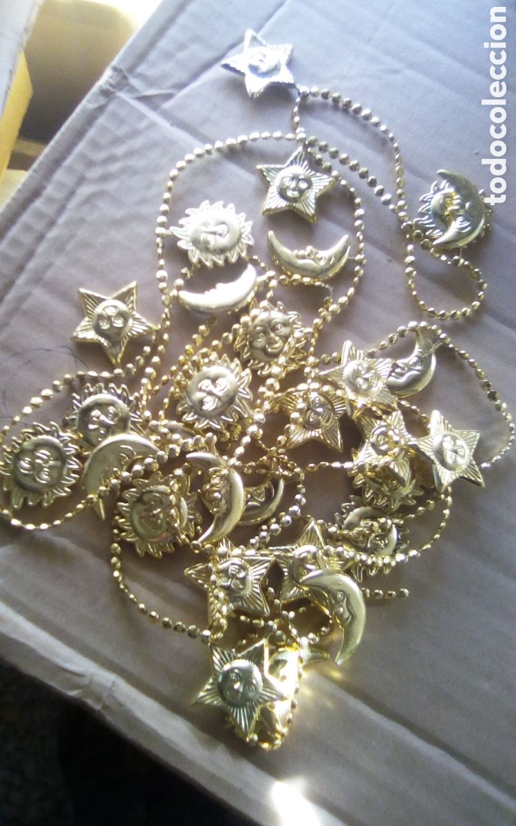 Coleccionismo: Tira de soles, lunas y estrellas. En pl&aacute;stico, mide de largo 2,60 mt. Para decoraci&oacute;n o collares.