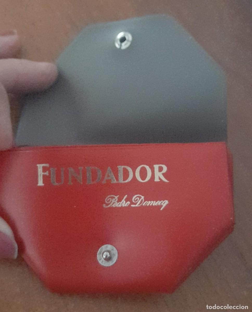 Coleccionismo: ANTIGUO MONEDERO CON PUBLICIDAD DE FUNDADOR, SIN USAR