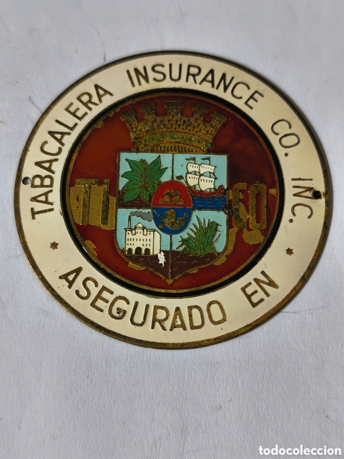 Coleccionismo: Antigua chapa ASEGURADO EN TABACALERA INSURANCE CO. INC.. 6 CM. DIAMETRO