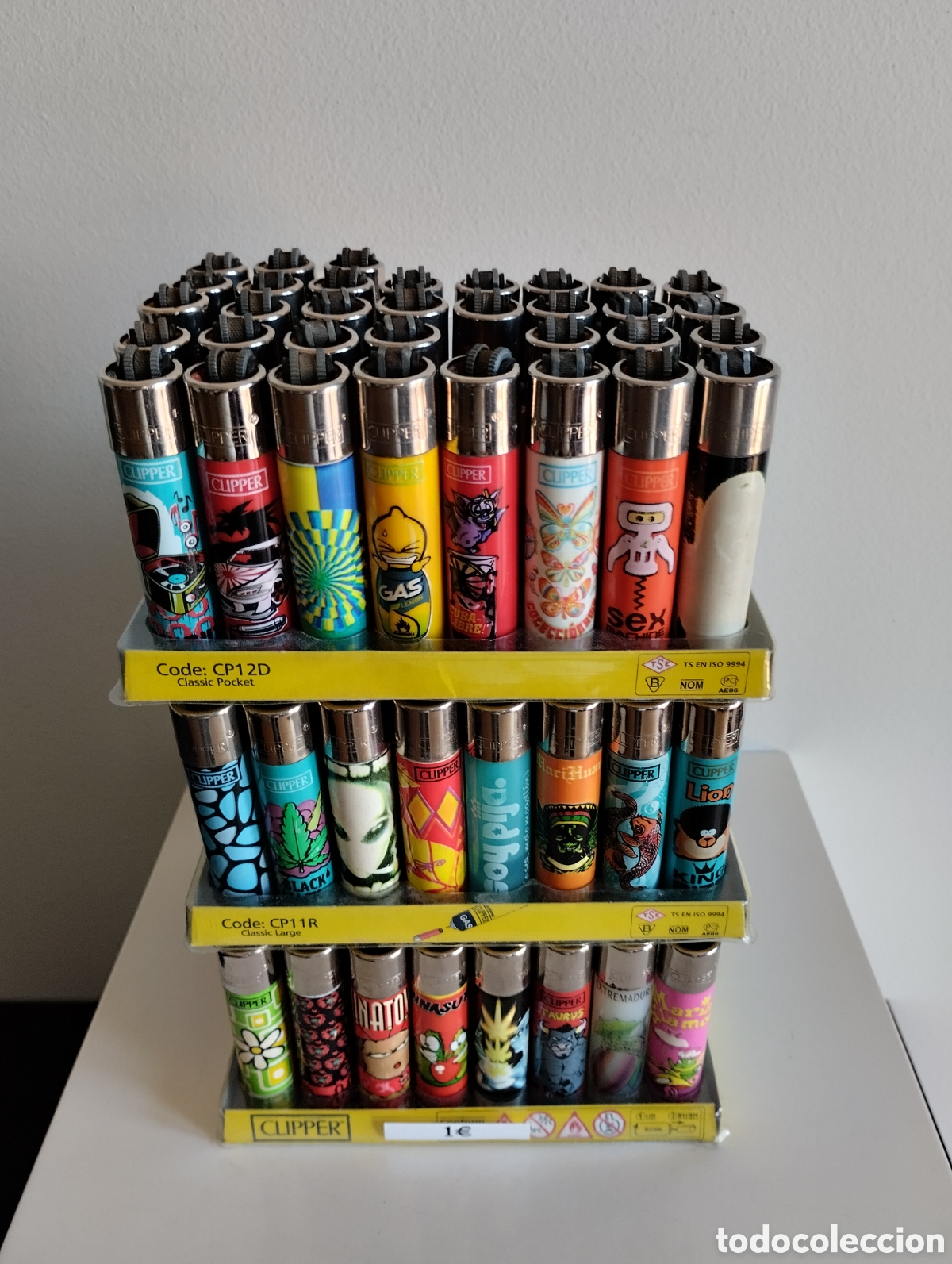 Coleccionismo: Lote de 130 Mecheros Clipper con su expositor mas 2 bolsas de Regalo. (Angel)