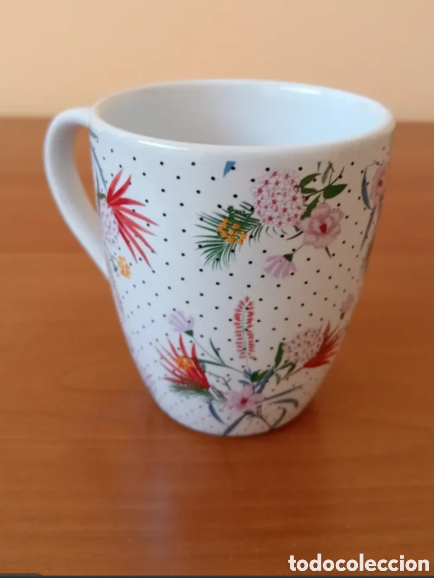 Coleccionismo: Taza de cer&aacute;mica con flores