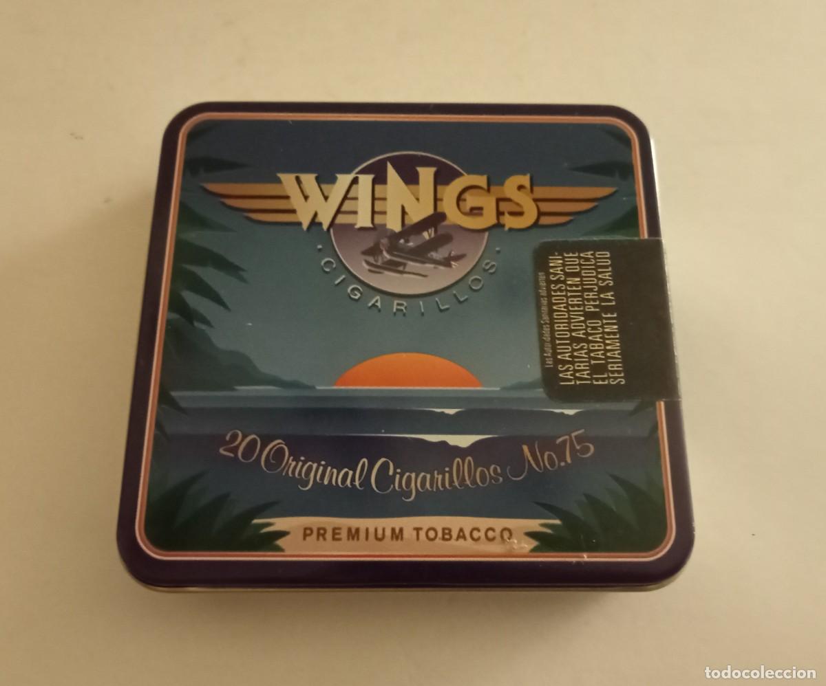Coleccionismo: WINGS - No.75 - CAJA MET&Aacute;LICA CIGARRILLOS VAC&Iacute;A - ANTIGUA
