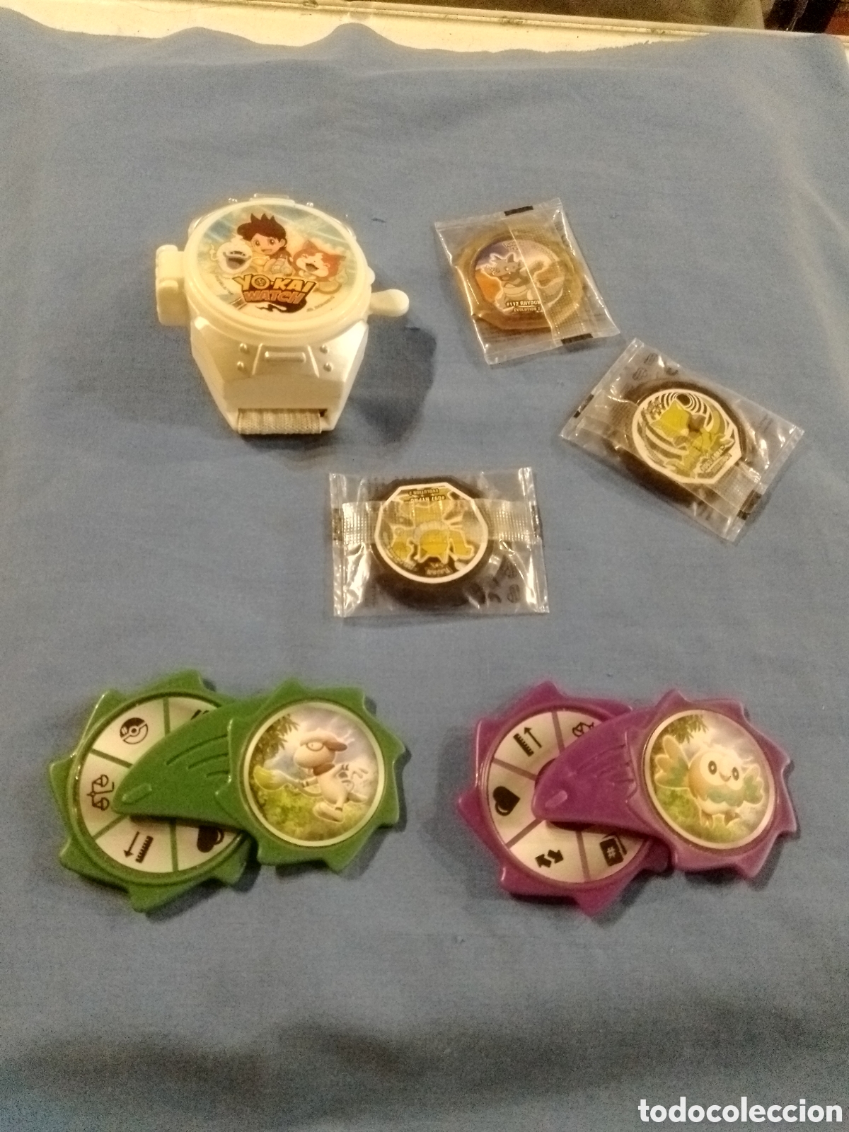 Coleccionismo: Fichas pokemon, brazalete, ruedas