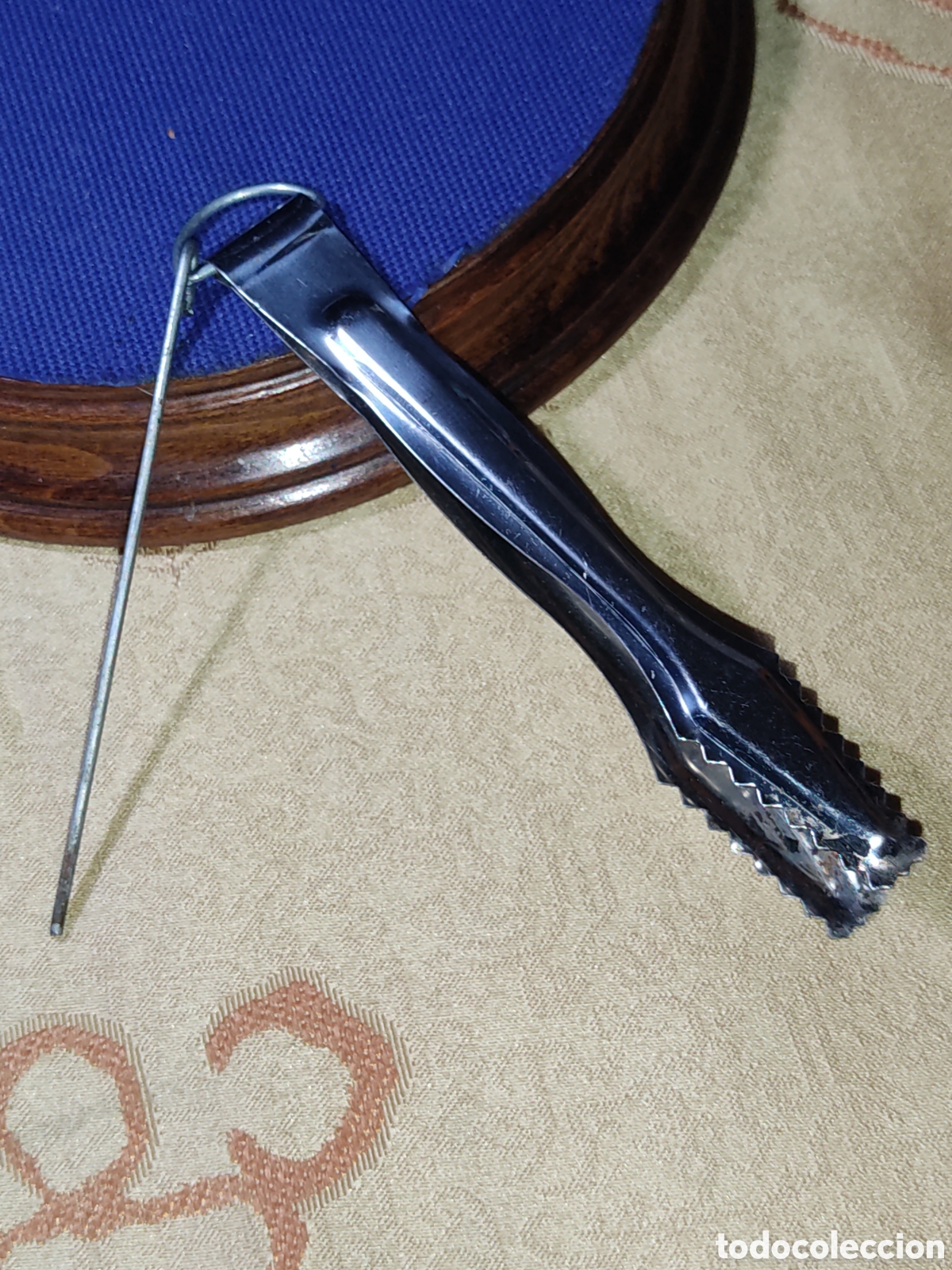 Coleccionismo: Pinza de acero para quemador.