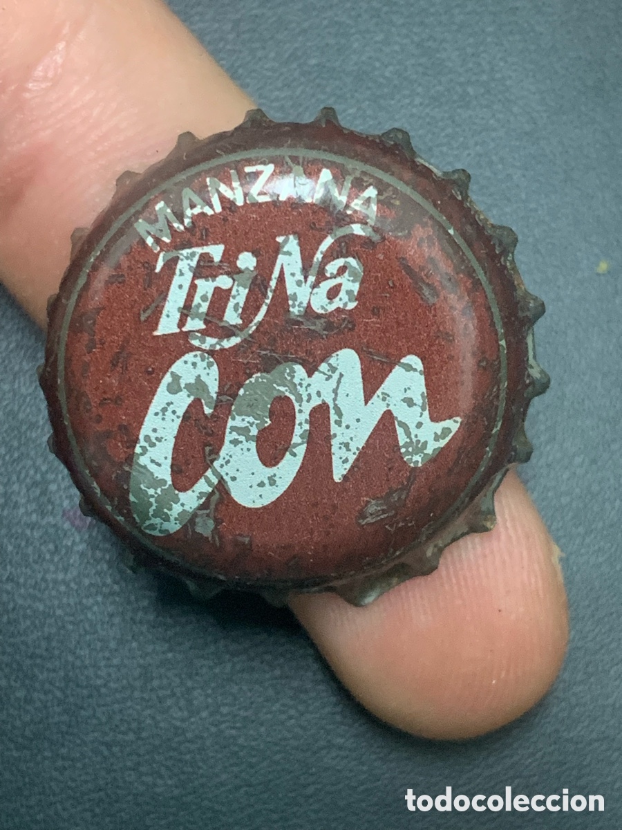 Coleccionismo: CHAPA CORONA TAP&Oacute;N - TRINA CON MANZANA