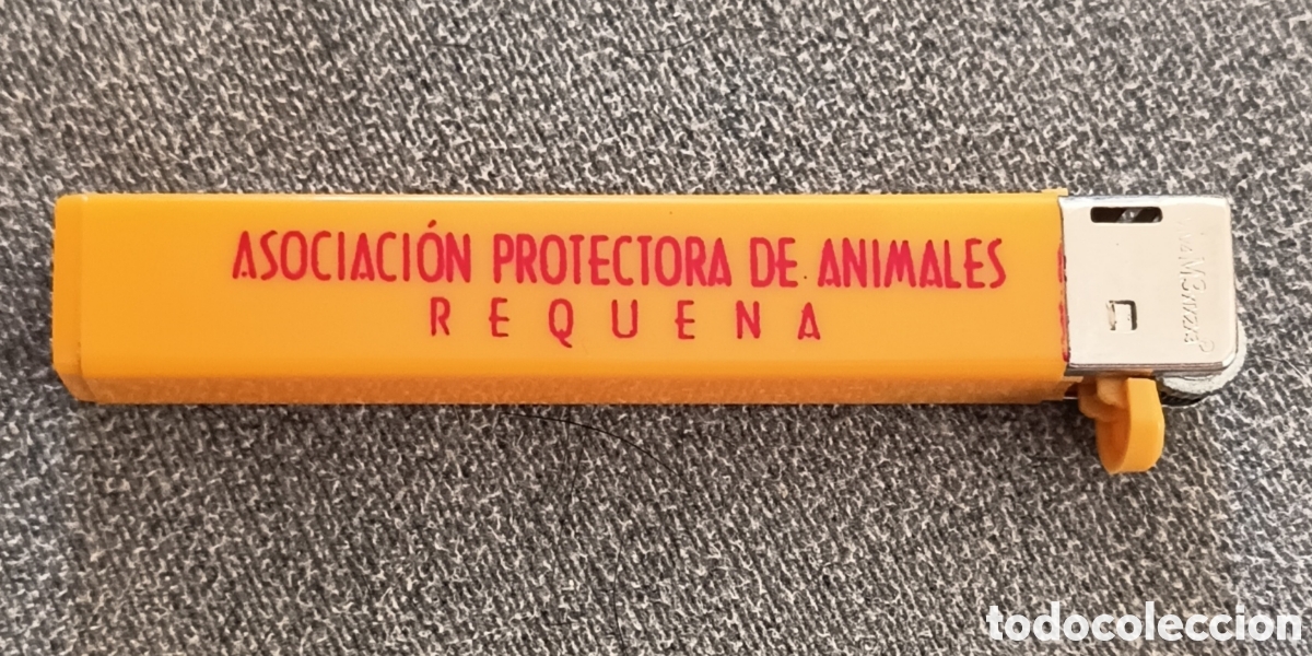 Coleccionismo: Mechero publicitario. Asociaci&oacute;n protectora de animales de Requena. Funciona. 1,00&euro;