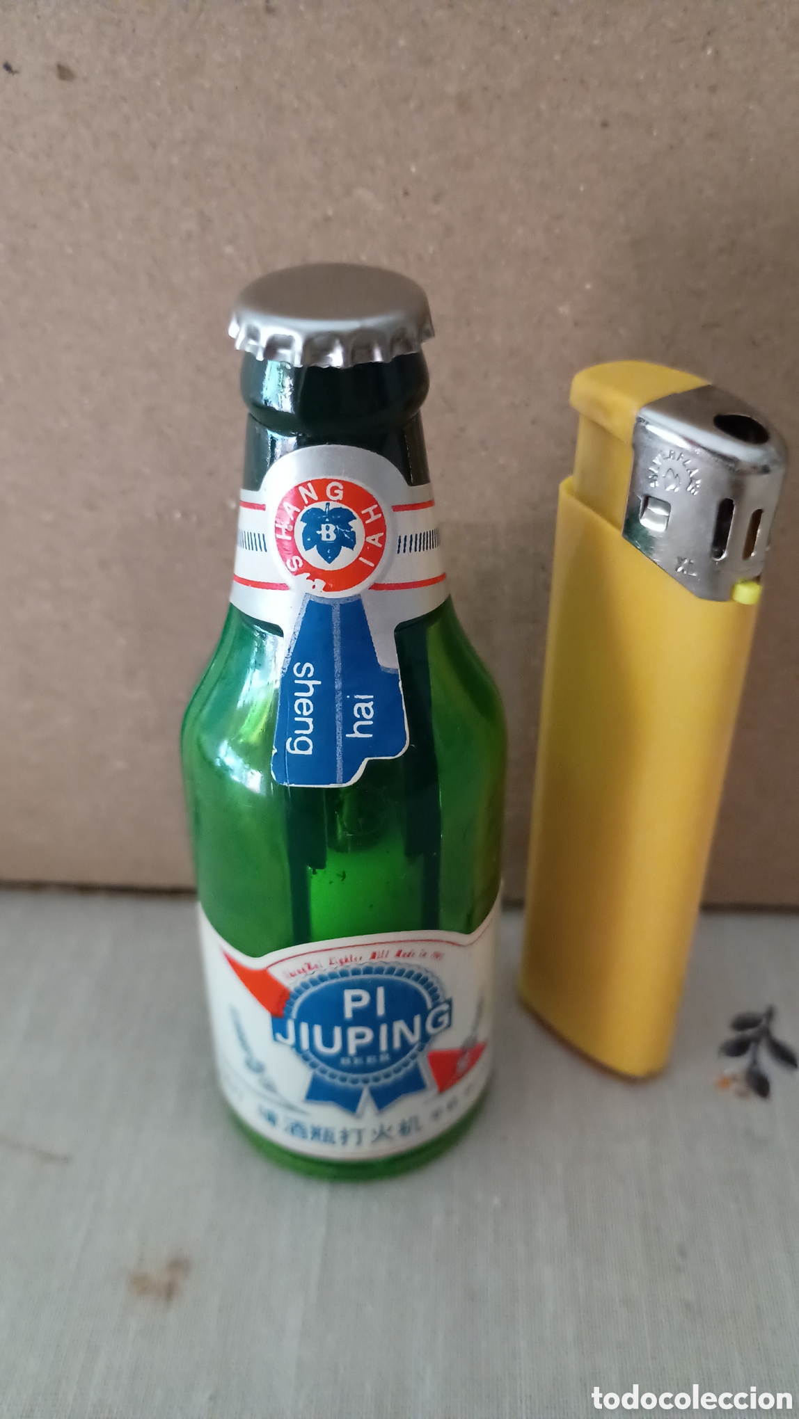Coleccionismo: Botellita mechero cerveza pi-jiumping
