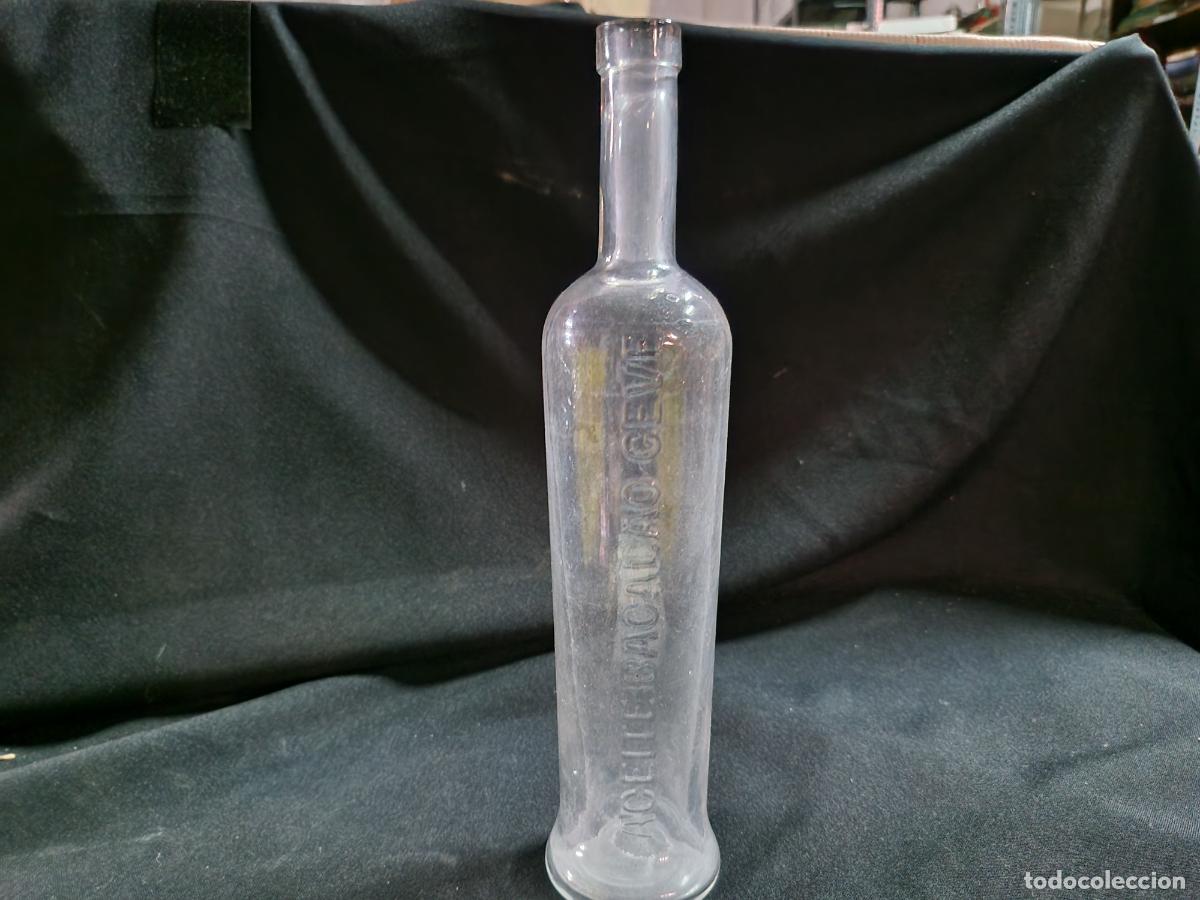 Coleccionismo: BONITA BOTELLA DE CRISTAL. ACEITE BACALAO 23CM A