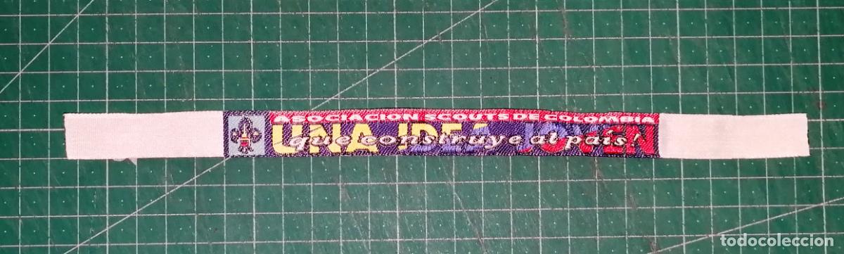 Coleccionismo: PULSERA TELA. ASOCIACI&Oacute;N SCOUTS DE COLOMBIA : Una idea que construye al pa&iacute;s!. - 2x26 cm aprox.