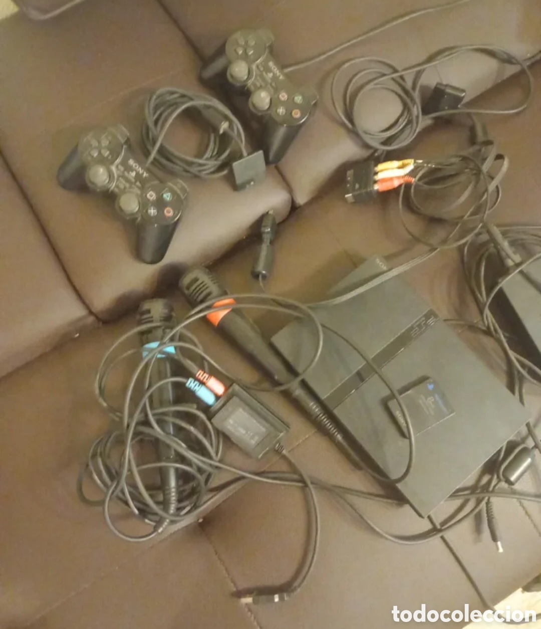 Coleccionismo: PlayStation 2,con 2 mandos,2 microfonos,12 juegos y 1 tarjeta de memoria