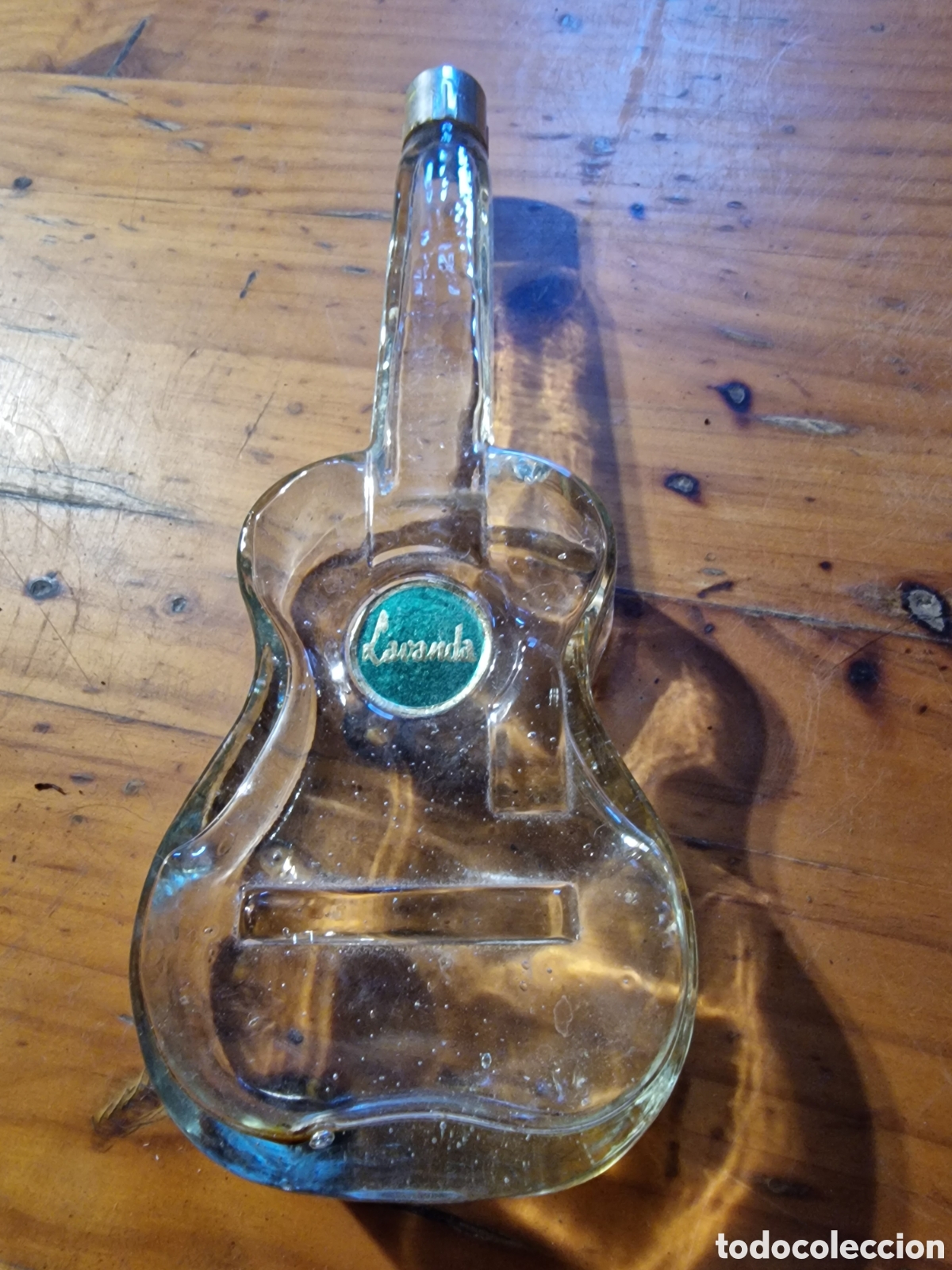 Coleccionismo: Antigua botella forma de guitarra,colonia lavanda,ideal coleccionista, medida 22cm aprox
