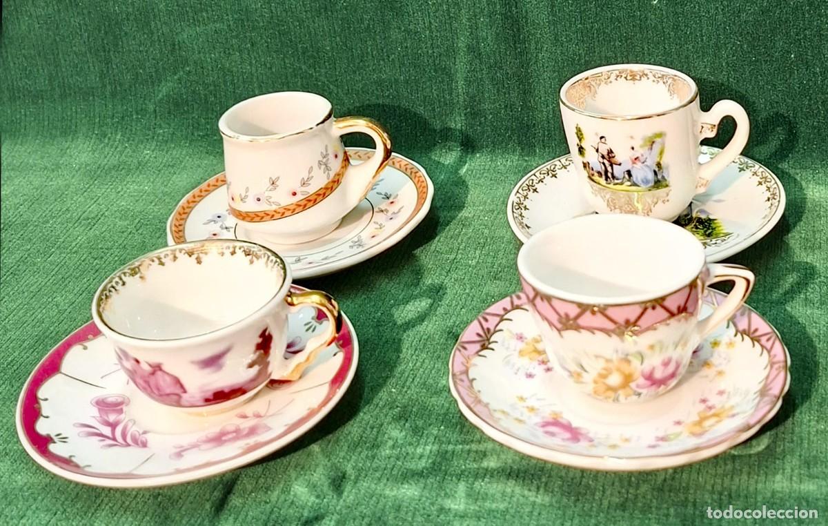 Coleccionismo: Conjunto de 4 tazas de porcelana,