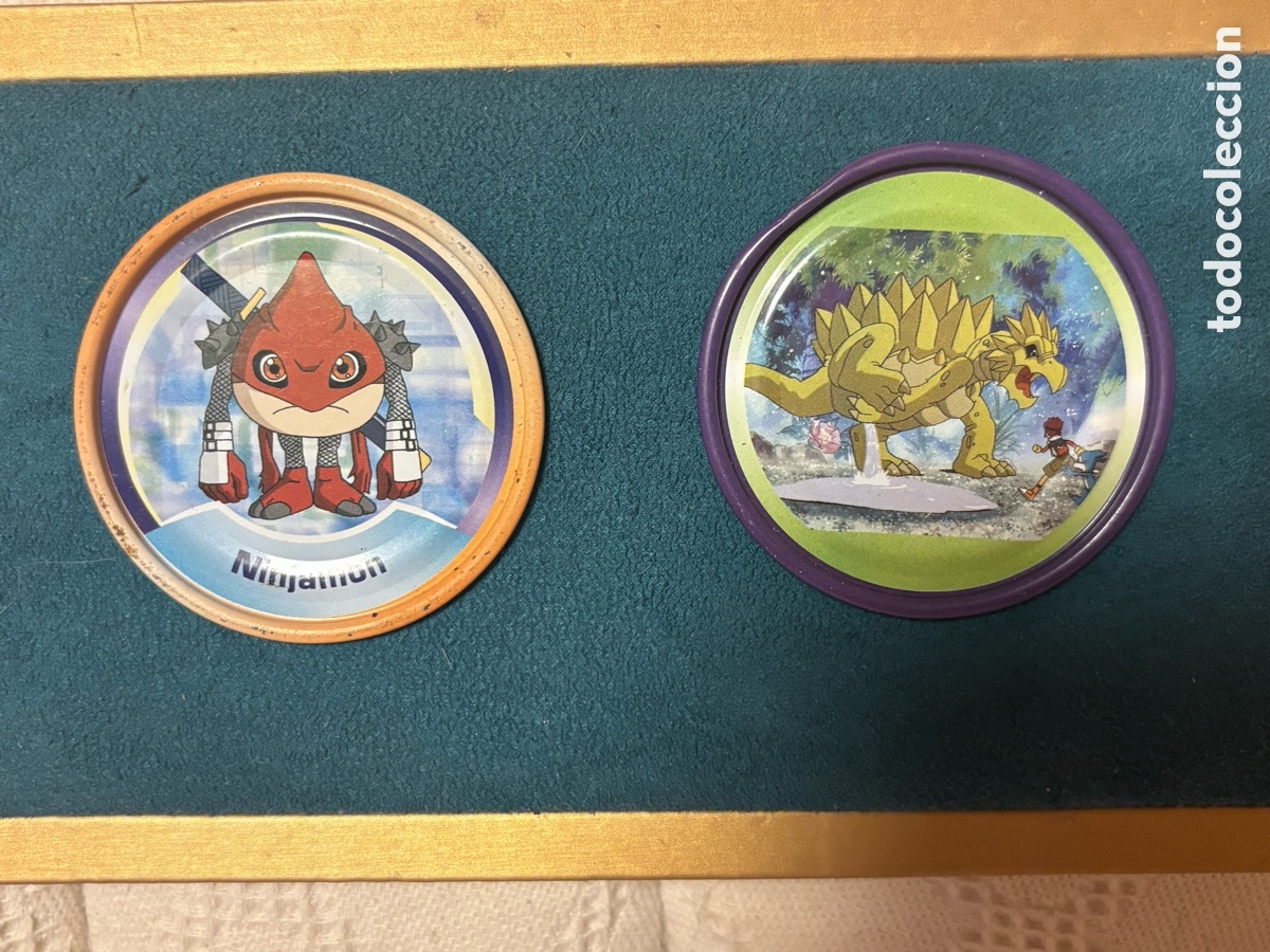 Coleccionismo: Dos rappers digimon tazos