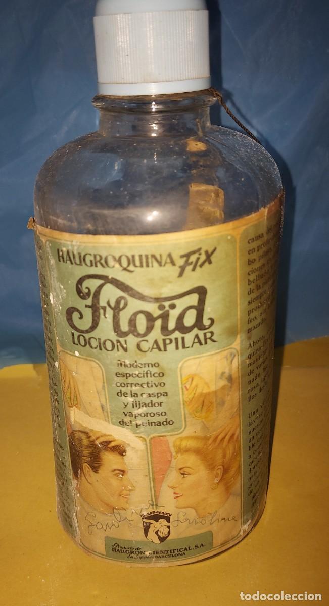 Collecting: FLOID, BOTELLA CON LIQUIDO DE LOCION CAPILAR FLO&iuml;D HAUGROQUINA