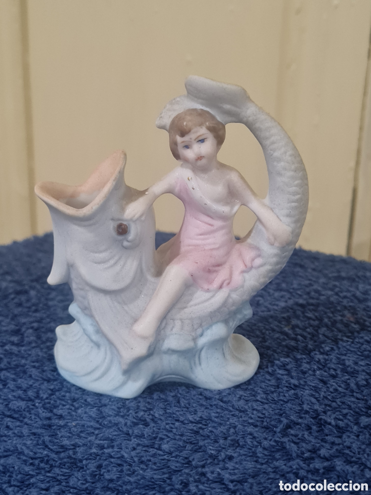 Collecting: Biscuit antiguo ni&ntilde;a con pez
