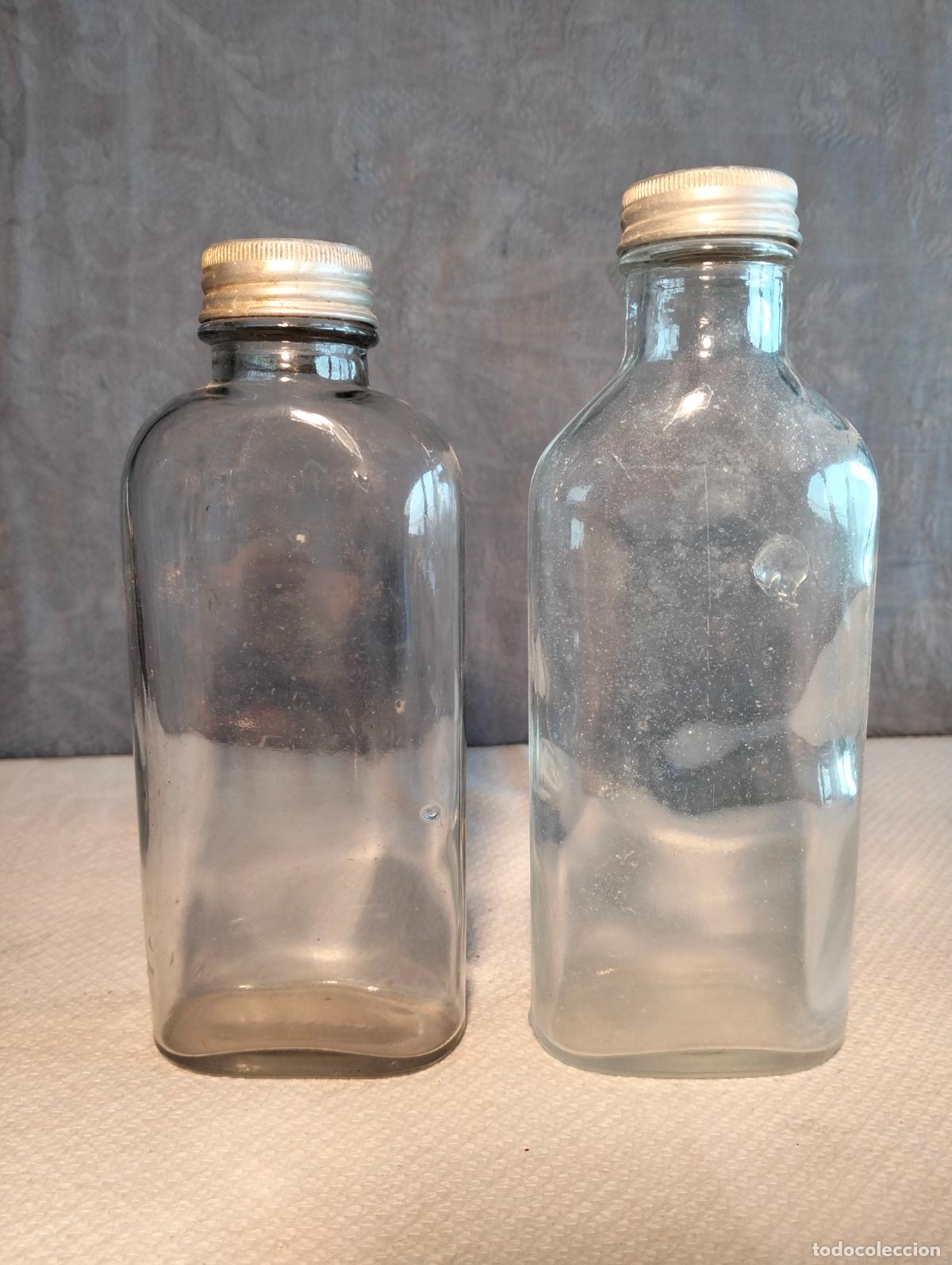 Coleccionismo: Pareja de botes frascos de cristal antiguos transparentes tap&oacute;n de metal aluminio a&ntilde;os 50-60