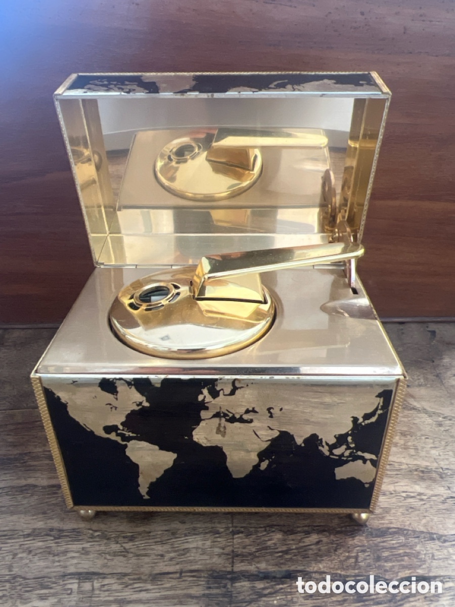 Collecting: MECHERO DE SOBREMESA CON CAJA MUSICAL