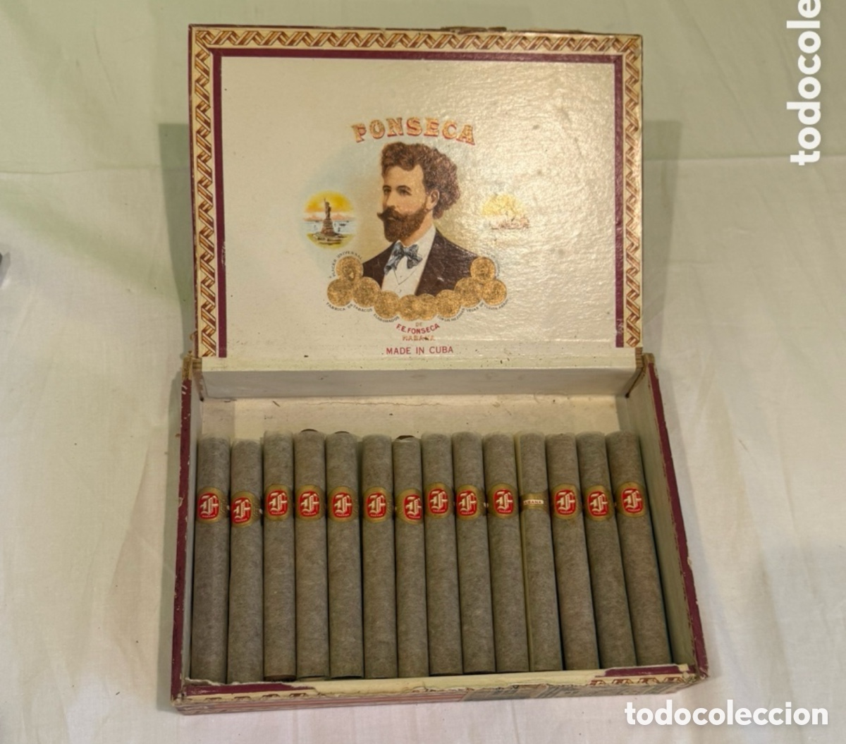 Coleccionismo: 14 puros FONSECA Habana Cuba en papel tis&uacute; &ndash; Caja Fonseca . Excelentes.