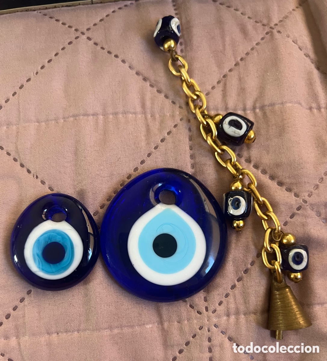 Sammeln: Lote de amuletos ojo cristal y campana