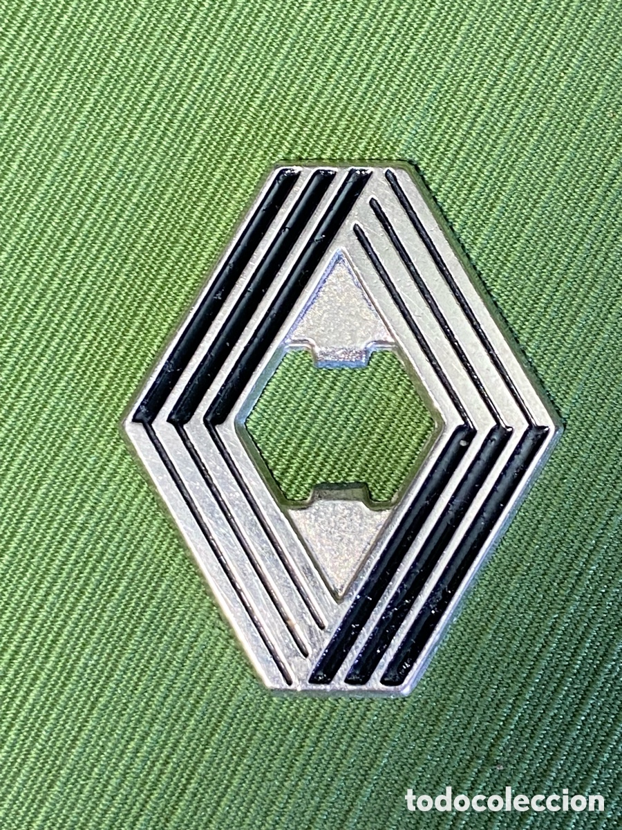 Coleccionismo: Abridor o abrebotellas antiguo con logo o anagrama de Renault