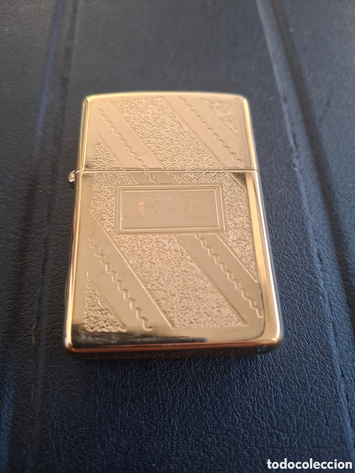 Coleccionismo: Zippo dorado muy nuevo grabado