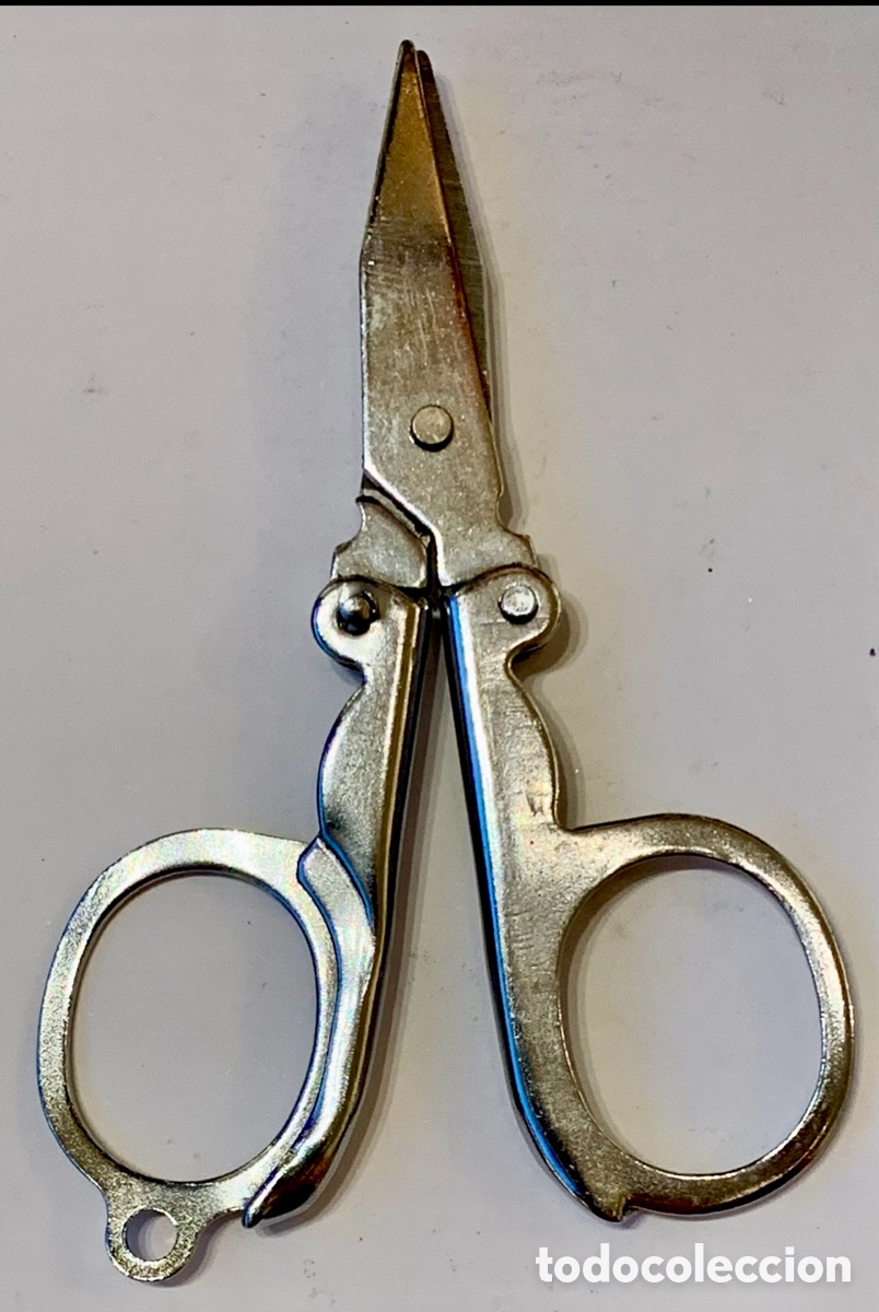 Coleccionismo: Tijera plegable de bolso. Metal. A&ntilde;os 90.