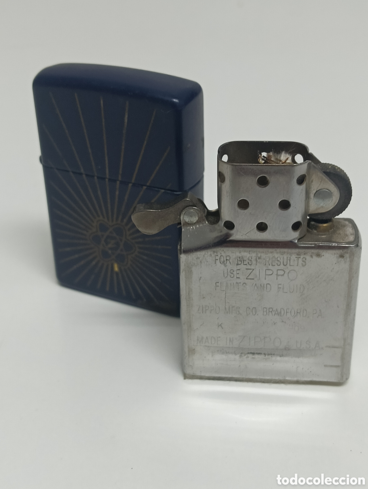 Coleccionismo: Zippo 2009 Azul S&iacute;mbolo At&oacute;mico - Foto 6