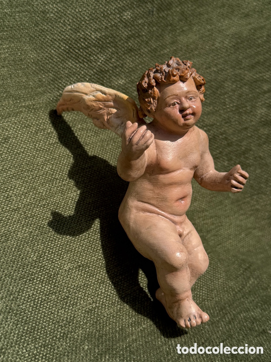 Sammeln: Querub&iacute;n cuerpo entero.