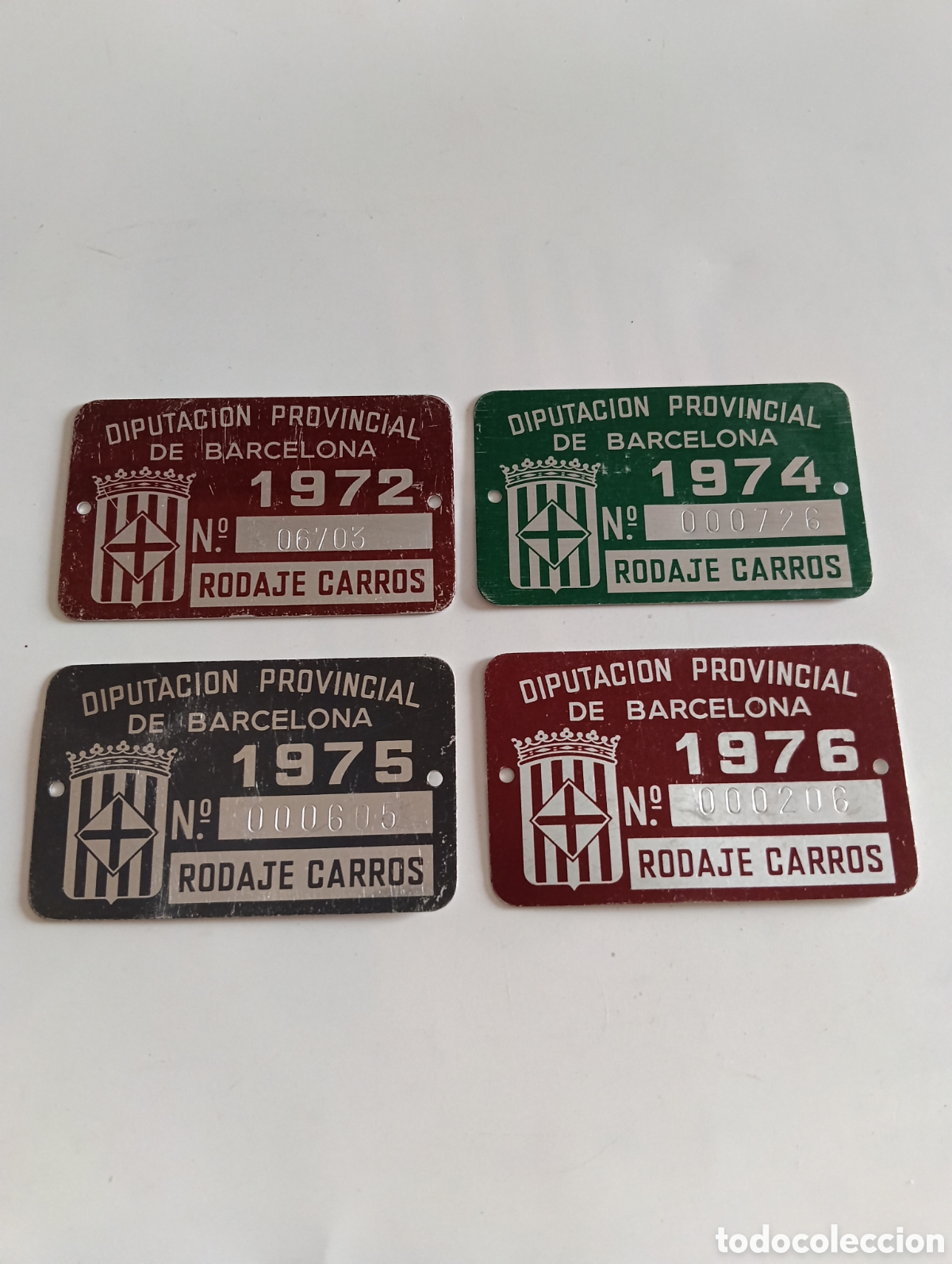 Coleccionismo: LOTE DE 4 CHAPAS DE MATR&Iacute;CULA RODAJE DE CARROS BARCELONA