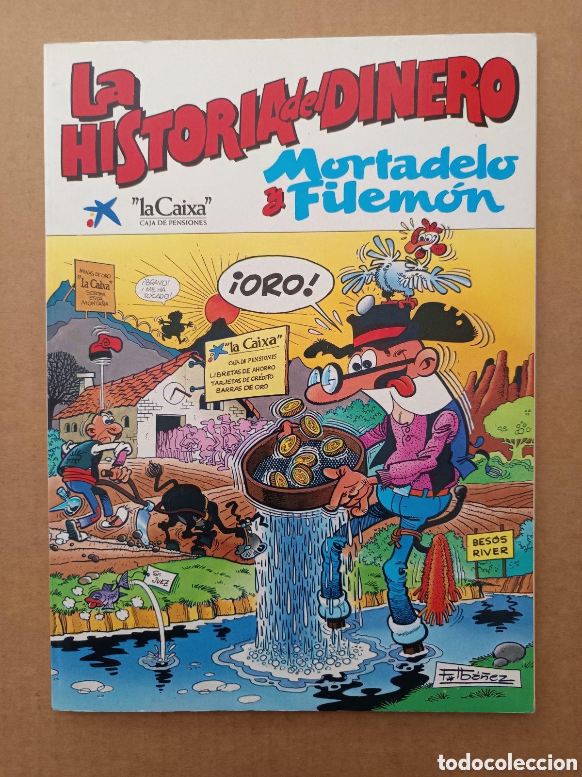 C&oacute;mics: Mortadelo y Filem&oacute;n: La Historia del Dinero (La Caixa/Ediciones B, 1989). - Foto 1