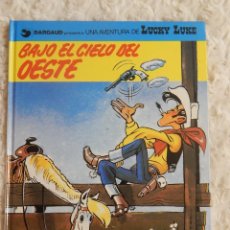 Cómics: UNA AVENTURA DE LUCKY LUKE - BAJO EL CIELO DEL OESTE - 52. Lote 248279545
