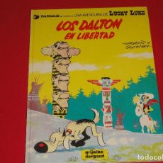 Cómics: AVENTURAS DE LUCKY LUKE Nº 21. LOS DALTON EN LIBERTAD. 1982. TAPA DURA. C-18