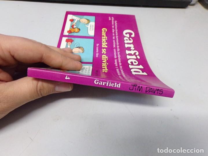 C&oacute;mics: ESTAMOS LIQUIDANDO. GARFIELD EDICIONES JUNIOR NUMERO 4 SE DIVIERTE REF 127 - Foto 6