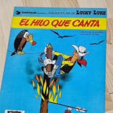 Cómics: LUCKY LUKE.EL HILO QUE CANTA- ALBÚM TAPA BLANDA(RUSTICA) GRIJALBO DARGAUD. 1983 - Nº10. Lote 338532403