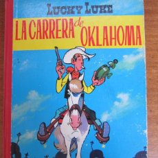 Cómics: LUCKY LUKE - LA CARRERA DE OKLAHOMA - LOMO DE TELA - ED. TORAY - 1964 -1A EDICION. Lote 400560474