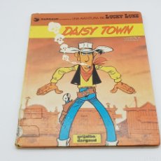 Cómics: COMIC LUCKY LUKE DAISY TOWN 1984 DARGAUD EN CATALAN TAPA DURA Nº 27