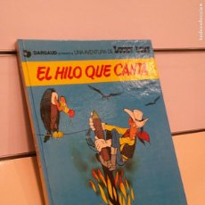 Cómics: DARGAUD PRESENTA LUCKY LUKE EL HILO QUE CANTA TOMO TAPA DURA - EDICIONES JUNIOR GRIJALBO
