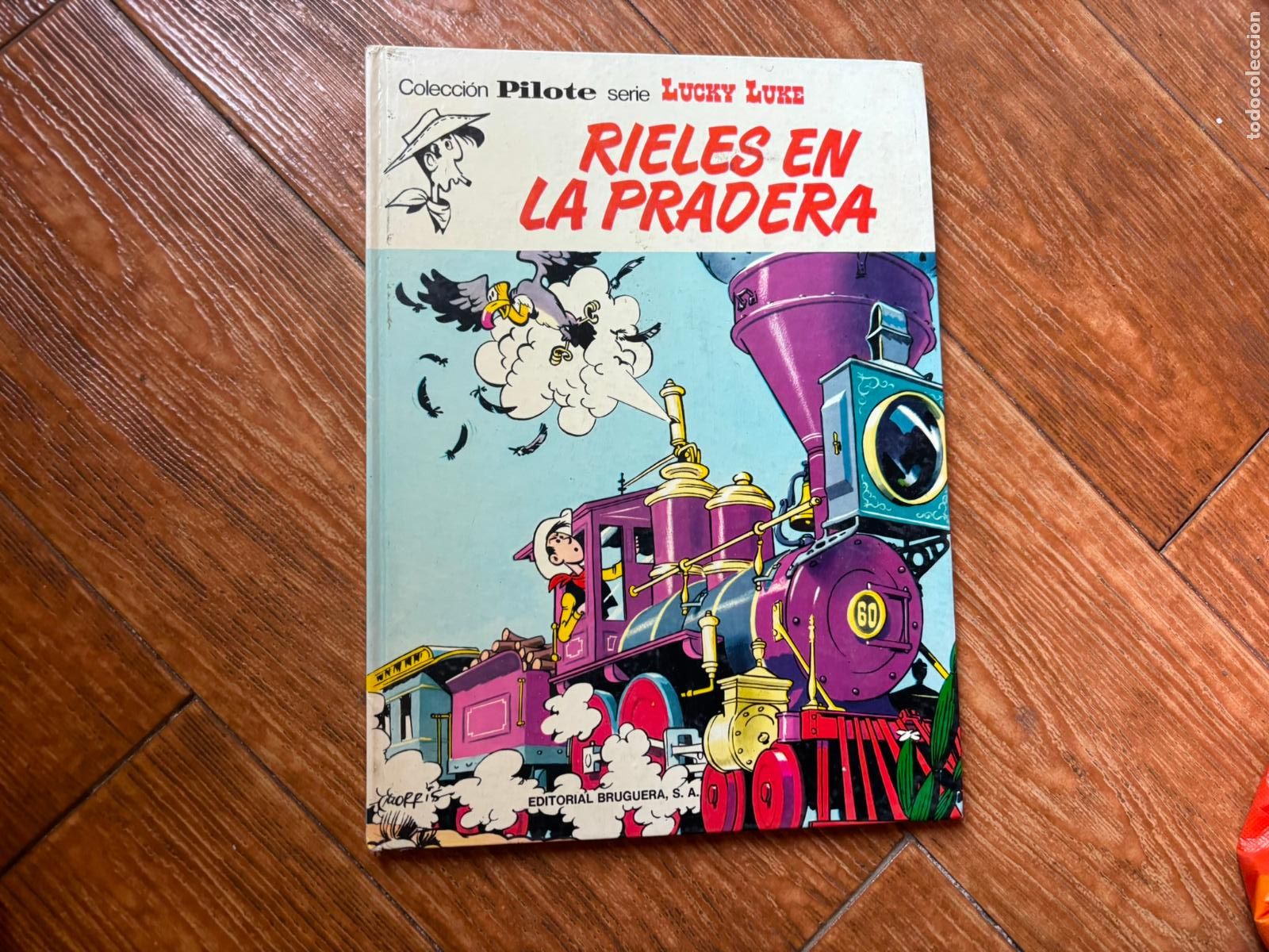 C&oacute;mics: LUCKY LUKE RIELES EN LA PRADERA PILOTE EDITORIAL BRUGUERA TAPA DURA