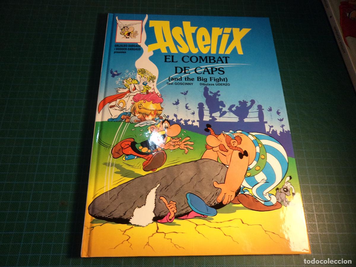 C&oacute;mics: Asterix. El combat de caps (and the big fight). Grijalbo. En catal&aacute;n e ingles.