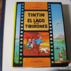 Cómics: HERGE LAS AVENTURAS DE TINTIN EN EL LAGO DE LOS TIBURONES 1986 SEPTIMA EDICION. Lote 243496055
