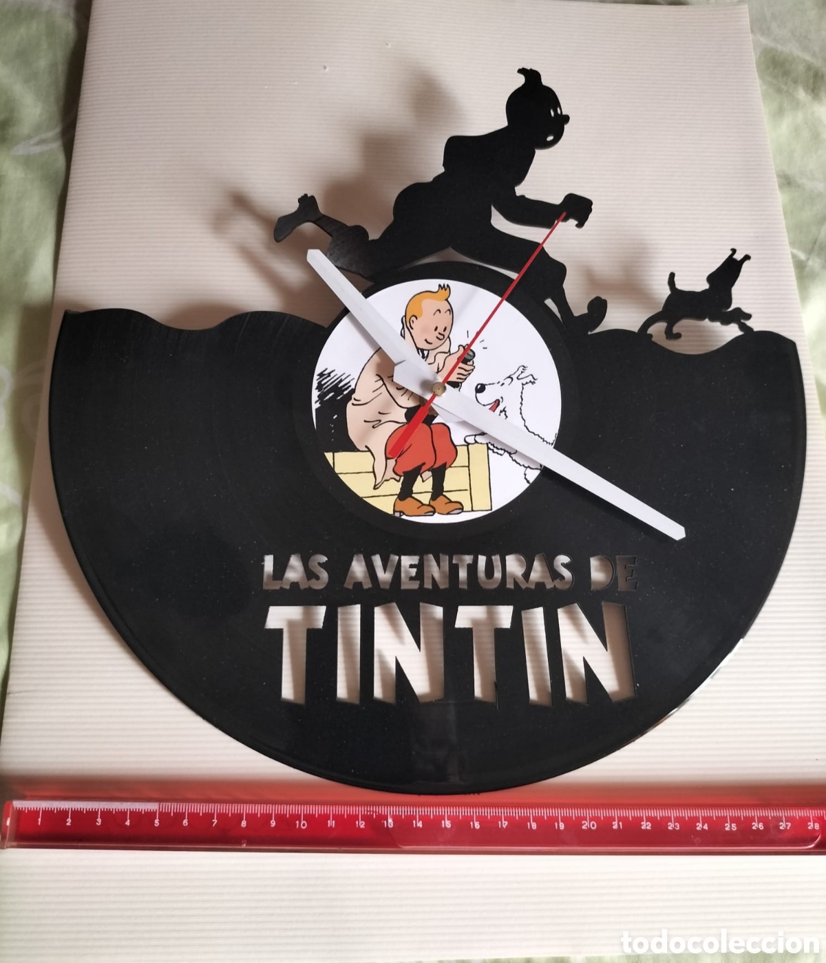 C&oacute;mics: RELOJ ARTESANO VINILO DE TINT&Iacute;N
