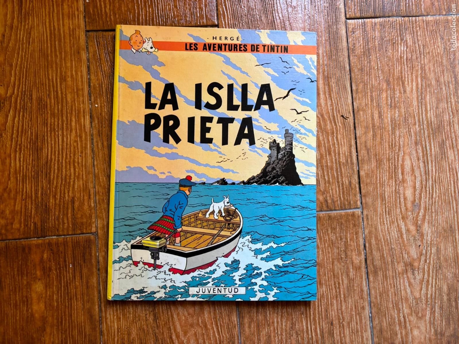 C&oacute;mics: LES AVENTURES DE TINTIN LA ISLLA PRIETA EDITORIAL JUVENTUD 1&ordf; EDICION EN BABLE - ASTURIANO. 1988