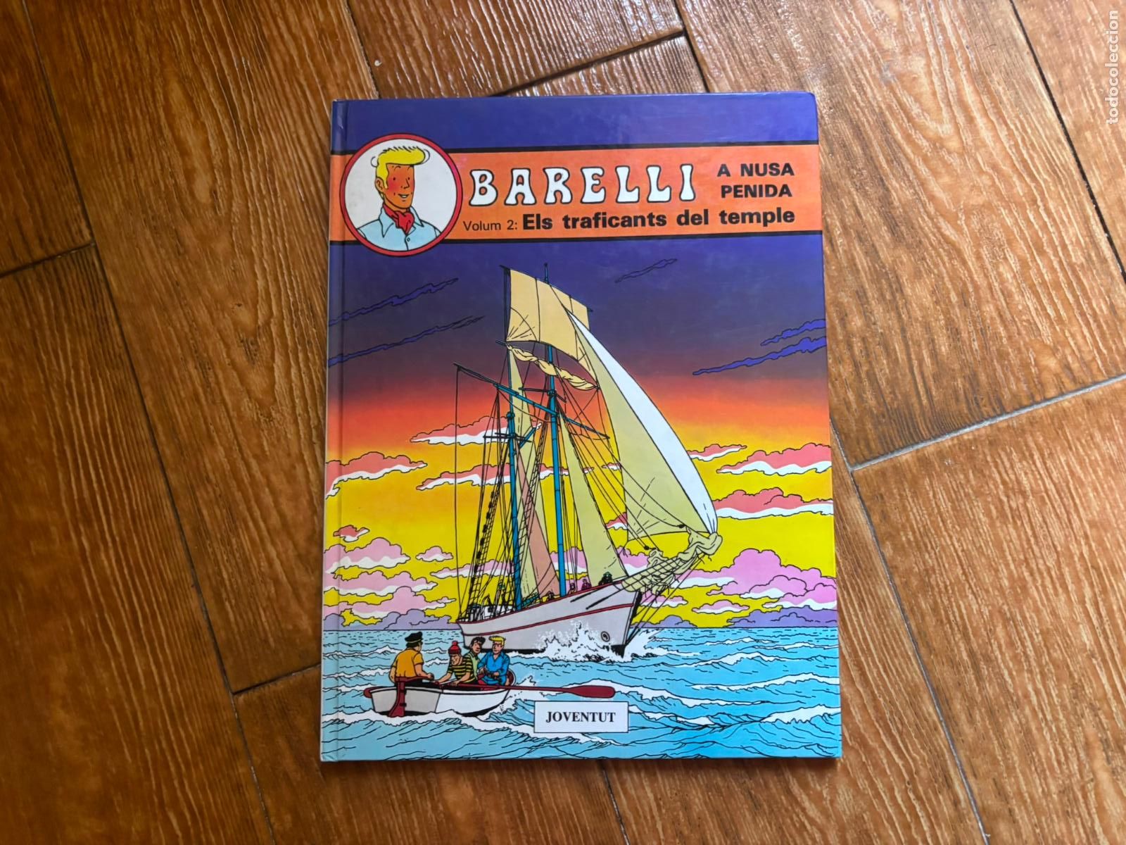 Comics : BARELLI A NUSA PENIDA - VOLUM 2 - ELS TRAFICANTS DEL TEMPLE - JOVENTUT - EN CATALAN TAPA DURA
