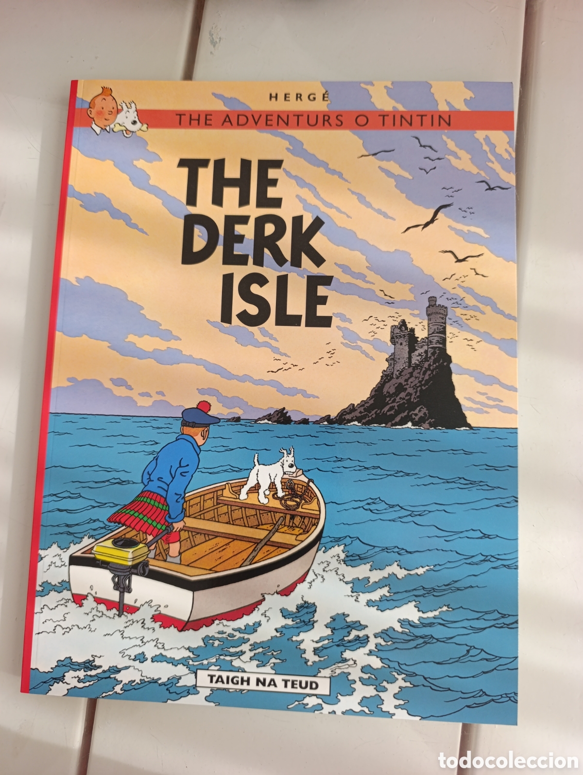 Comics : TINTIN IDIOMAS - ESCOC&Eacute;S - LA ISLA NEGRA / THE DERK ISLE