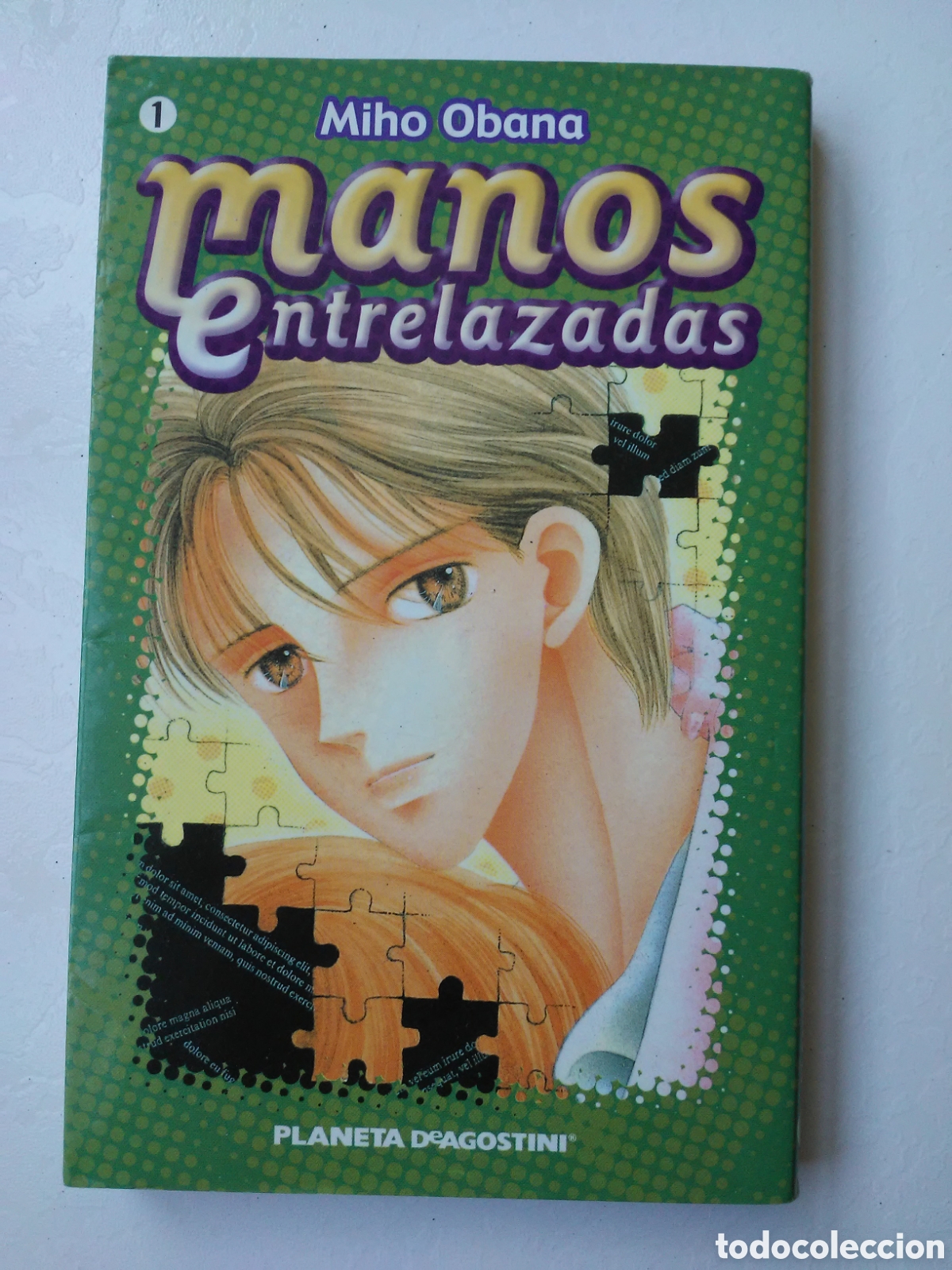 Fumetti: Manos entrelazadas 1 / Miho Obana / Ed. Planeta DeAgostini en Barcelona 2003